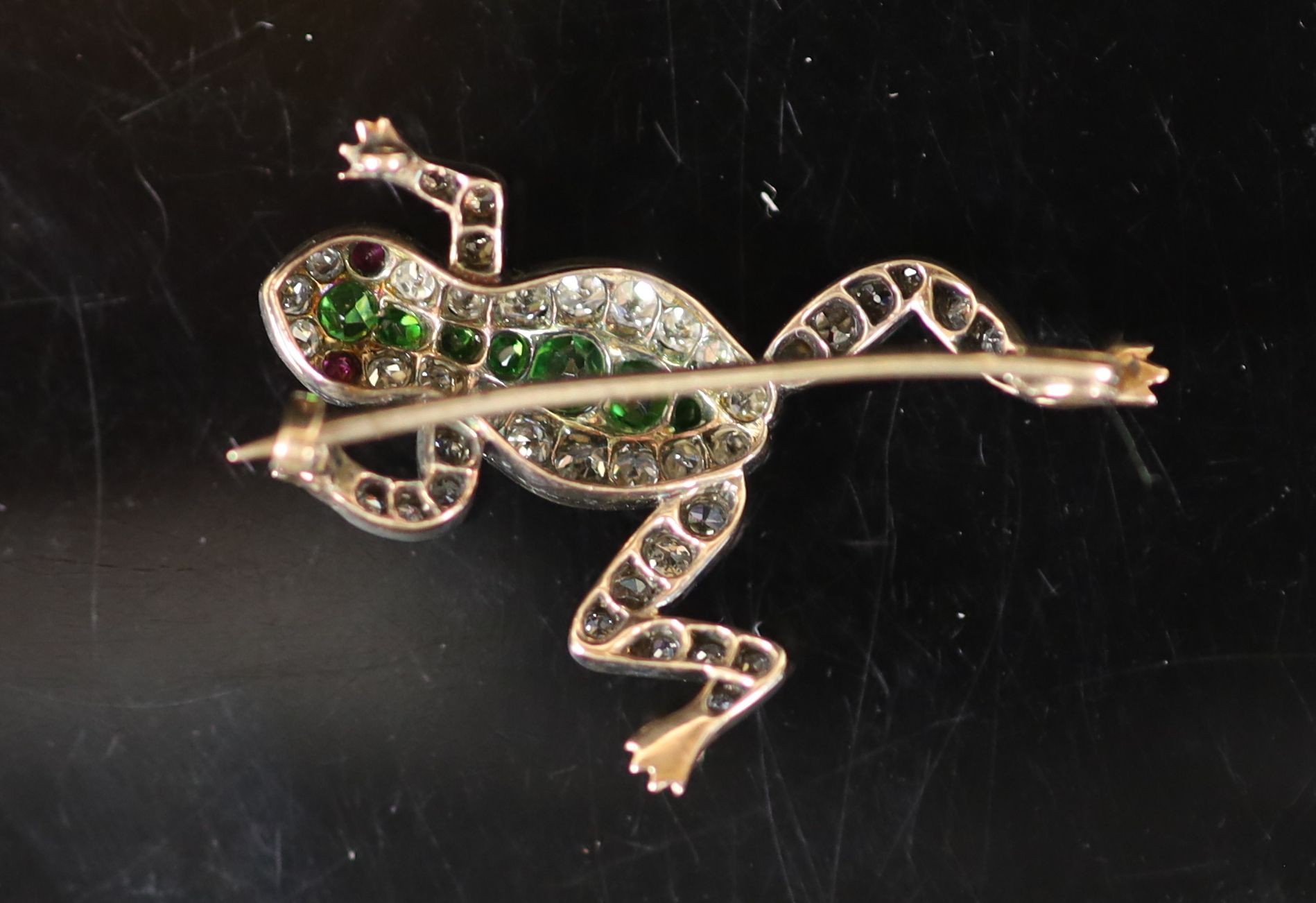 A late Victorian gold and silver, diamond and demantoid garnet cluster set brooch, modelled as a frog
